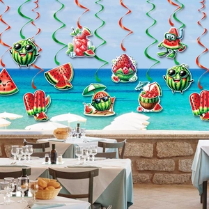 Watermelon summer party decorations with hanging swirls and cartoon paper cutouts