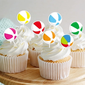 Colorful beach ball cupcake toppers for summer volleyball themed party decorations