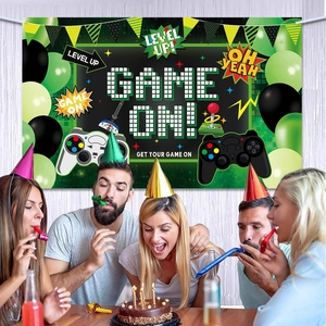 Video game party backdrop banner with Game On text and controller graphics for birthday decor