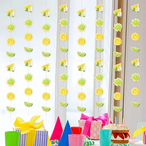 Summer lemon and lime hanging garlands for birthday party decoration in bright colors