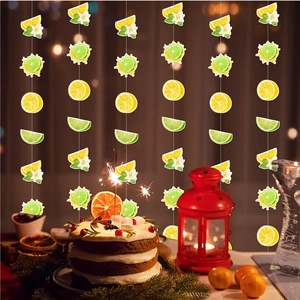 Vertical lemon and lime party streamers for summer theme birthday celebrations