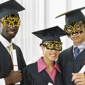 Graduates wearing 2026 paper party glasses with Congrats and You Did It slogans