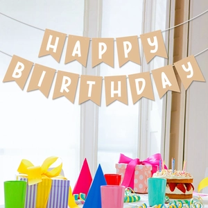 Classic kraft paper HAPPY BIRTHDAY banner set with strawberry cake and party favors