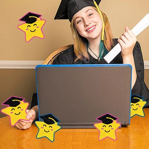 Glittering star graduation table decorations with smiling face and mortarboard hat