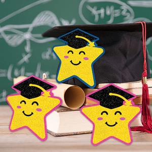 Yellow smiling star graduation ornaments with black academic cap on a school background