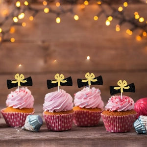 Sparkly graduation cupcake toppers with black scroll design for party cake decorations