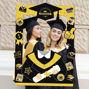 Black and gold graduation photo frame prop with doctor caps and celebratory slogans