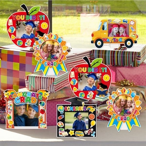 Colorful graduation paper photo frames set with YOU DID IT motifs and school bus shapes