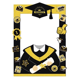 Graduation party photo booth frame in black and gold with Congrats Grad slogans