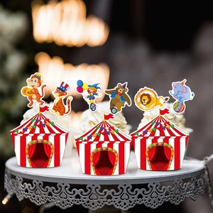 Circus carnival party cupcake wrappers and animal cake toppers set on display