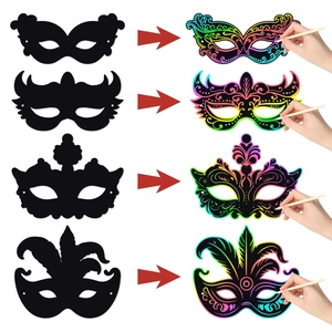 DIY scratch art masquerade masks showing black to rainbow transition for party photo props