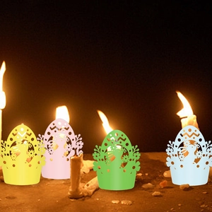 Easter cupcake wrappers with laser-cut rabbit and egg designs in four pastel colors