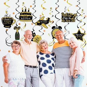 Happy Retirement hanging swirl decorations with black and gold party theme cards