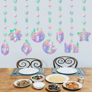 Hanging Eid decorations with laser-cut iridescent stars and moon for festive party decor