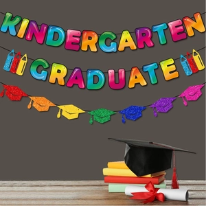 Rainbow Kindergarten Graduate banner with glitter mortarboards for preschool party