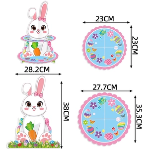 Two-tier Easter bunny cupcake stand with colorful egg and carrot decorations for parties