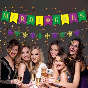 Detail of Mardi Gras party banner with gold letters and glitter fleur-de-lis decorations