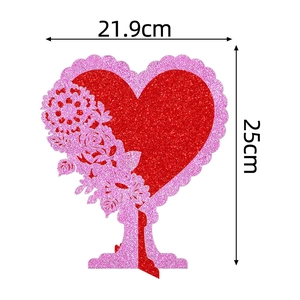 Detail of red and pink heart table decor with floral lace edges and size dimensions