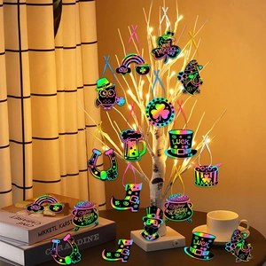 Rainbow St. Patrick's Day scratch cards with shamrock motifs on a decorative tree