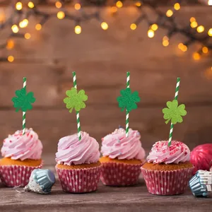 Glitter clover straw toppers for St. Patrick's Day party decor on cupcakes