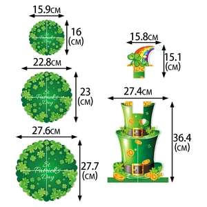 St. Patrick's Day tiered cake stand set with green shamrock and rainbow party decorations