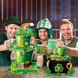 Three-tier St. Patrick's Day cupcake stand and leprechaun pot in Irish pub party setting