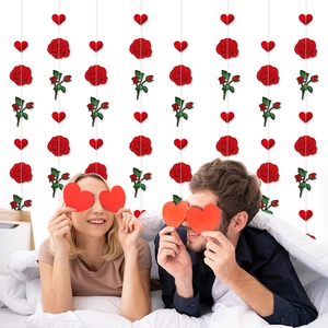 Valentine's Day hanging banner featuring red paper roses and hearts for party decor