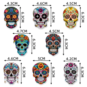 Set of 8 colorful Day of the Dead sugar skull stickers with floral designs for parties