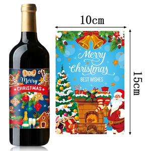 Detail view of 10x15cm Christmas wine bottle stickers with Santa and fireplace designs