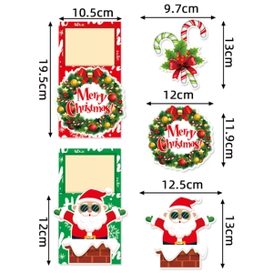 Detailed dimensions of Christmas cutlery card holders featuring Santa and wreath patterns