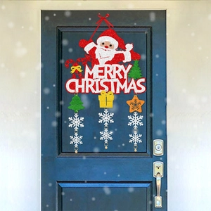 Christmas door hanger with Merry Christmas sign, Santa Claus, and white snowflake pendants