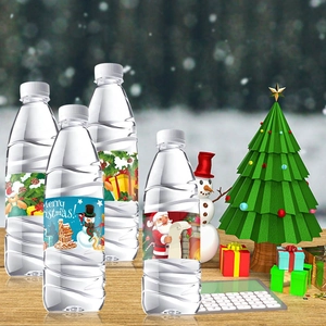 Detailed view of Christmas themed bottle labels with Santa and Snowman holiday patterns