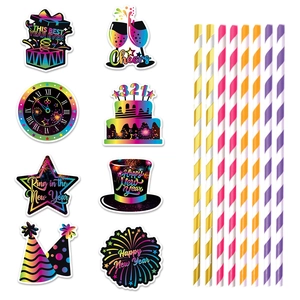 New Year's Eve party decoration straws with rainbow gradient paper cutouts on white background