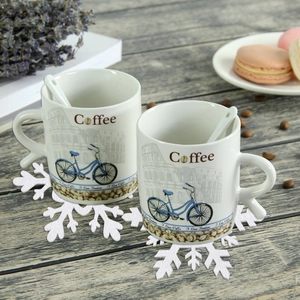 Ceramic coffee cup set with bicycle design, spoons and white snowflake felt coasters