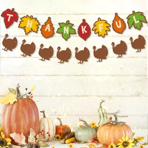 Thankful letter banner with maple leaves and turkey silhouette for Autumn party decor