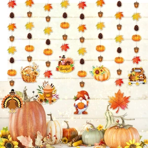 Guirlande de Thanksgiving avec feuilles d'érable et citrouilles pour fête d'automne