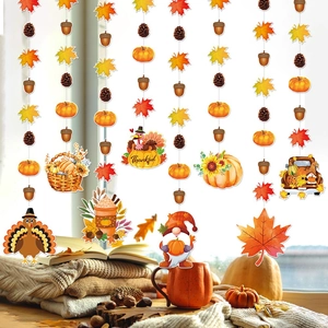 Guirlandes d'automne avec feuilles d'érable et citrouilles pour déco de fête de Thanksgiving