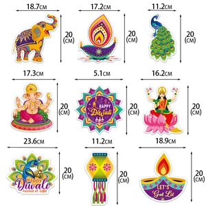 Set of 9 Indian Diwali wall stickers featuring Diya, Ganesha and colorful peacock motifs