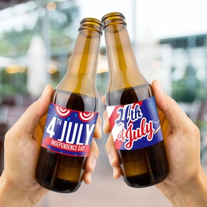 Handheld glass bottles with USA 4th of July Independence Day themed decorative stickers