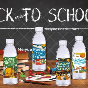 Detail of vibrant Back to School water bottle labels featuring school supply illustrations