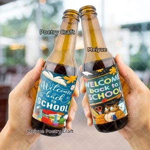Macro shot of Welcome Back to School labels applied on brown glass bottles outdoors