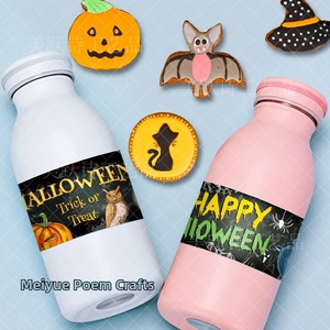 Detail of Halloween water bottle stickers featuring Happy Halloween text and spooky icons