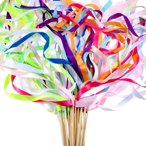 Wedding ribbon wands with colorful silk streamers and bells for party celebration