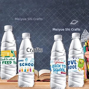 Close-up of four waterproof Back to School water bottle labels with chalkboard patterns