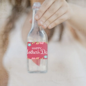 Floral Mother's Day water bottle labels with Happy Mother's Day text and pink floral patterns