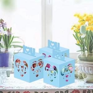 Father's Day blue paper gift box with heart-shaped cutout and DAD letter design