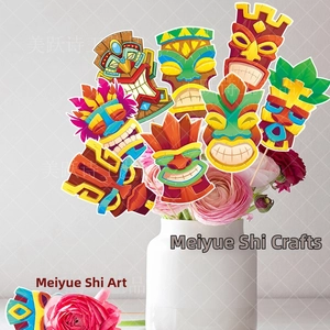 Tropical Tiki mask photo props in a white flower vase for Hawaii party decoration
