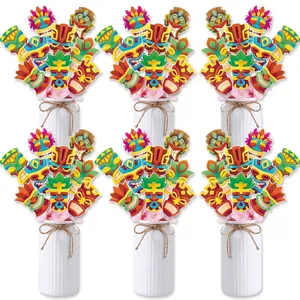 Tropical Hawaii Tiki party mask toppers displayed in a white vase for party decoration