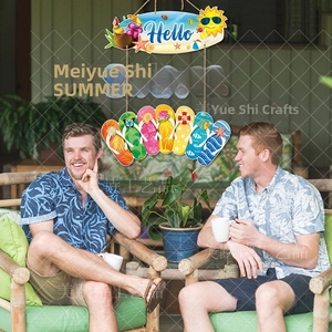 Close-up of Hello Summer door hanger featuring colorful flip-flops and rustic twine rope