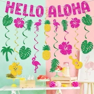Close-up of glittery Hello Aloha banner and tropical flamingo swirls for Hawaii party